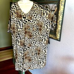 Nwt Must Have Zim & Zoe Animal Print Short Sleeve Knit Dress- Great Black Trim On Shoulder/ Sleeve & Back Center - Nice Stretch-Perfect Anytime/ Anywhere As Endless Wardrobe Possibilities Size 26/28 Unstretched Measurements Approximate 34”Armpit To Armpit, 41”Length Ask Questions- Open Reasonable Offers Brown Oversized Short Sleeve Dress, Brown V-neck Loungewear Dress, Brown V-neck Dress For Loungewear, Zoe Animal, Beach Wrap Dress, Navy Blue Lace Dress, Flowy Midi Dress, Green With Blue, Fredericks Of Hollywood