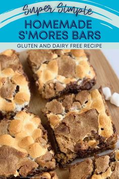 homemade s'mores bars on a cutting board with marshmallows