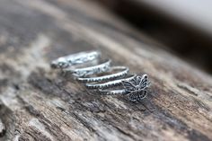 This gorgeous and dainty butterfly stacking ring set features one intricate sterling silver butterfly dotted ring band with two matching dotted rings and two Art Nouveau stacking bands. All together they make a beautiful and elegant stacking set in honor of all the beautiful butterflies all over who stay busy pollinating our gardens and helping to keep all of us alive. Wear this stacking set with any outfit to show your love of nature and butterflies! Set includes: -2 sterling silver Art Nouveau Dot Ring, Art Nouveau Floral, Sterling Silver Stacking Rings, Stacking Bands, Stacking Ring Set, Butterfly Ring, Silver Stacking Rings, Silver Art, Flower Ring