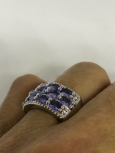 Unusual Deep purple blue Tanzanite Sterling Filigree Setting Handmade size 6 Can be resized, my jeweler uses a laser and charges a $10 -$20 fee. All rings are shipped in a nice gift box. Check out our over a THOUSAND great reviews Engraving is $4 per letter and is not always perfect depending on the piece. It can take a few days if the jeweler is busy. This is payable to Paypal Judithsltd@gmail.com Blue Amethyst Ring Gift, Blue Amethyst Ring Fine Jewelry For Gift, Blue Amethyst Ring For Anniversary, Blue Amethyst Ring Fine Jewelry Gift, Blue Amethyst Ring For Anniversary In Fine Jewelry Style, Blue Amethyst Gemstone Ring Gift, Blue Amethyst Ring With Accent Stones In Sterling Silver, Blue Oval Amethyst Ring For Gift, Blue Oval Amethyst Ring In Sterling Silver