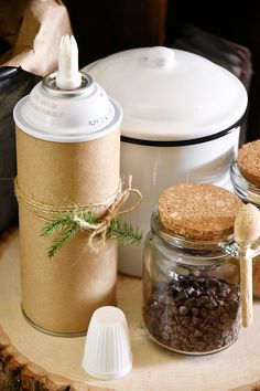 the jars are filled with coffee beans and cinnamons, next to an ice cream dispenser