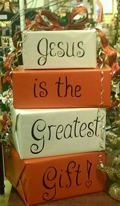 three boxes with the words jesus is the greatest gift stacked on top of each other