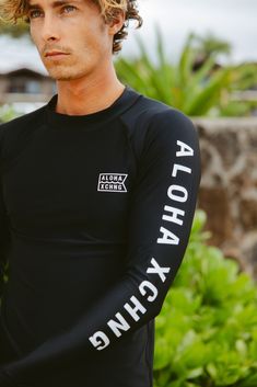 Double Shaka Sun Blocka Longsleeve Rashguard Built to maximize your time in and around the water with comfortable sun protection. This performance fit rashguard is perfect for those extended surfs. Great for fishing from a boat, kayak, shore, and even diving. If you like roll no gi, can. Fit Fits true to your usual wetsuit/rashguard size. Better to fit snug than too loose. Size down if you are in between sizes. Features Double Shaka Sun Blocka UPF 30+ rating shields from harmful sun rays and all Yacht Uniform, New Radicals, Muscle Guys, Rocket Power, Long Sleeve Rashguard, Surf Shirt, Dragon Boat, Surfing Waves, Surf Wear