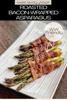 bacon wrapped asparagus on a white plate with the words sweet savored bacon wrapped asparagus