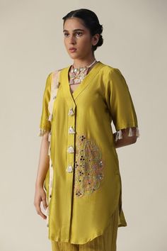 Green tunic featuring side patchwork pattern, embellished by beads, mirror, tassels and embroidered mandala motifs. Comes with striped pant. - Aza Fashions Traditional Unstitched V-neck Kurta, Traditional V-neck Sets With Resham Embroidery, Festive Chanderi V-neck Kurta, Traditional V-neck Set With Resham Embroidery, Embroidered V-neck Kurta For Eid, Embroidered Bollywood V-neck Set, Bollywood Style Embroidered V-neck Set, Bollywood Style V-neck Embroidered Sets, Embroidered Chanderi V-neck Sets