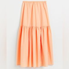 Brand New With Tags Maxi Skirt From H&M. Apricot Pastel Orange Color. Tiered And 100% Cotton. Very On Trend Right Now. Elasticated Waist. See Pictures For Approximate Measurements And Details. Perfect Brand New Condition. Smoke Free And Pet Friendly Home. Bundle And Save Or Make An Offer! Pastel Orange Color, Pastel Skirts, Army Green Skirt, Bohemian Maxi Skirt, Maxi Sequin Skirt, Green Maxi Skirt, Sheer Maxi Skirt, Maxi Skirt Style, Chiffon Maxi Skirt