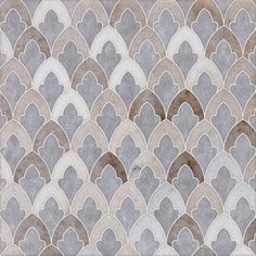 an abstract tile design with grey and white colors on the surface, including wavy shapes