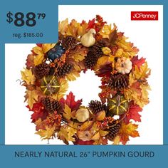 a wreath with autumn leaves and acorns is on sale for $ 8 99