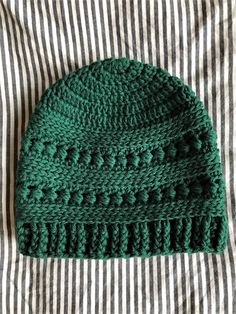 Women's Crochet Hat/Crochet Beanie/Winter Hat This uniquely textured crochet hat is handmade with love and will keep you cozy through Fall and Winter. Pictured here is a forest green color, but you can request several different colors; just be sure to specify the variation before adding to your cart! It is made with a very cozy wool blend yarn.  Hand-wash and line dry only. If you have questions about sizing, feel free to send me a message.  **Please tell me if you or the recipient of this garment have any fiber allergies so that I can be sure it is safe to wear.** Crochet Pom Pom Hat, Feminist Embroidery, Chemo Beanies, Textured Crochet, Crochet Skull, Crochet Hat For Women, Hat Light, Chunky Knit Hat, Red Beanie