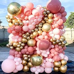 a bunch of balloons that are on top of a table