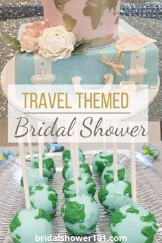 travel themed bridal shower cake pops with green frosting and pink flowers on top