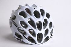 a white helmet with holes on the side