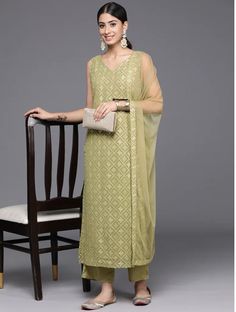 *Women Ethnic Motifs Embroidered Regular Sequinned Kurta with Trousers & With Dupatta Pakistani Salwar Kameez / Indian Wedding Dress / Plus Size Cotton Dress Traditional Indian Wear / Salwar Kameez Dupatta / Kurti Palazzo Set / Hand Embroidery kurta Olive green embroidered Kurta with Trousers with dupatta *Kurta design:-  *  Ethnic motifs embroidered   *  Straight shape   *  Regular style   *  V-neck, sleeveless no sleeves   *  2 pockets sequinned detail   *  Calf length length with straight hem Sleeveless Wedding Kurta With Zari Work, Semi-stitched Sleeveless Dress For Diwali, Semi-stitched Sleeveless Kurta For Festive Occasions, Sleeveless Traditional Wear With Resham Embroidery, Sleeveless Anarkali With Floral Embroidery, Elegant Sleeveless Traditional Wear With Dupatta, Sleeveless Semi-stitched Dress For Diwali, Sleeveless Kurta With Resham Embroidery For Wedding, Bollywood Style Sleeveless Kurta For Wedding