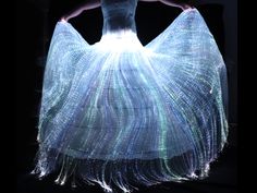 This skirt is made of fiber optic. The fiber optic is fixed on the yarn, and can be directly covered in the inner lining or the skirt. There is a remote control, it can change different colors and multiple flash modes. Materials: fiber optic, yarn fiber optic skirt length: about 1.2meters (120cm/47inches) (support custom) waist: support custom size, just left the waist circumference inches or cm,  this waist is not elastic, please note it. Light color: red/orange/blue/green/purple/light blue/whi Light Up Dresses, Wedding Dressses, Optical Fiber, Wedding Skirt, Fibres Textiles, Wedding Dress Fabrics, Fiber Optic, Burning Man, Apparel Fabric