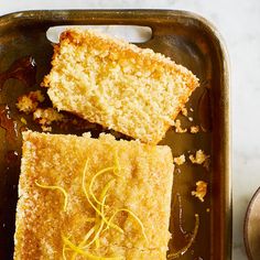 two pieces of cake sitting on top of a pan