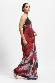 Red, maroon saree with rose print all over. Comes with running blouse piece. - Aza Fashions Festive Red Pre-draped Saree With Printed Motifs, Elegant Party Saree With Printed Motifs, Festive Red Saree With Floral Print, Festive Red Floral Print Saree, Red Silk Saree With Floral Print, Red Floral Print Saree For Wedding, Red Pre-draped Saree With Printed Motifs, Red Semi-stitched Saree With Printed Motifs, Red Saree With Printed Motifs For Wedding