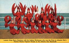 a group of people in red costumes on a boat