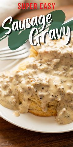 sausage gravy on a white plate with a fork