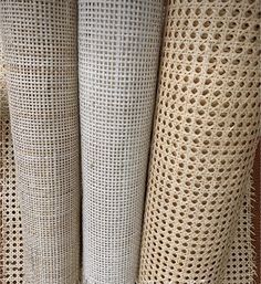 three pieces of white woven material are stacked on top of each other in different patterns