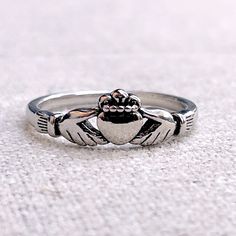 Silver Claddagh Irish Love Ring Size 6 Brand New A Claddagh Ring Is A Traditional Irish Ring In Which A Heart Represents Love, The Crown Stands For Loyalty, And Two Clasped Hands Symbolize Friendship. Irish Love, Clasped Hands, Irish Ring, Sterling Silver Stackable Rings, Pear Wedding Ring, Unique Rings Vintage, Silver Flower Ring, Silicone Wedding Rings, Stackable Rings Silver