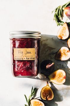 fig jam in a jar surrounded by figs