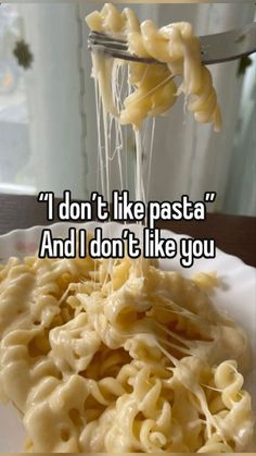 someone is eating pasta with the caption i don't like pasta and i don't like you