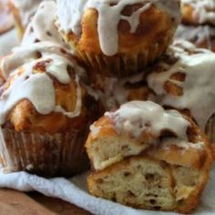 some muffins with icing on top of them