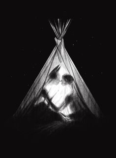 a black and white photo of a person in a teepee with their head up