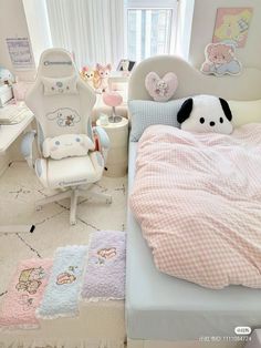 a child's bedroom with a bed, chair and desk in the corner is decorated in pastel colors