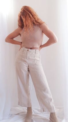 100% linen features side pockets, back pockets, belt loops. Size 8 Measurements: Waist: 32" Hips: 42" Rise: 10.5" Inseam: 25" Leslie is 5'3" and a size 4 Cropped Linen Trousers, Crop Trousers, Linen Crops, Linen Trousers, Cropped Trousers, Pure Linen, Size 4, Trousers, Pure Products