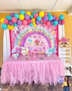 a birthday party with balloons and decorations