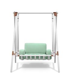 a green and white swing bed with two pillows on it's backrests