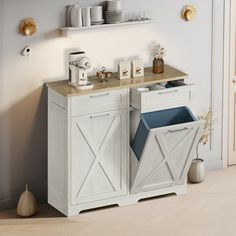 a kitchen with a white cabinet and blue bins on the counter next to it