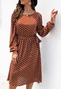 The Emes Shop dress is detailed with a classic polka dot print. Features a round neck line. long sleeves. low back detail. flowy skirt. and knee length. Pair it with knee-high boots and sunnies for a cool look.MATERIAL:95%Polyester 5%SpandexMEASUREMENTS: Product Length 42.91"-44.1"in 4-6-Small | Waist: 25-26.5in | Chest: 33-34.5in | Hips: 35-36.5in 6-8-Medium | Waist: 26.5-28in | Chest: 34.5-36in | Hips: 36.5-38in 8-10-Large | Waist: 28-29.5in | Chest: 36-37.5in | Hips: 38-39.5in 10-12-X-Large | Long Sleeve Polka Dot Dress For Spring, Spring Polka Dot Long Sleeve Midi Dress, Spring Long Sleeve Polka Dot Midi Dress, Long Sleeve Polka Dot Midi Dress For Summer, Trendy Long Sleeve Brown Dress, Chic Long Sleeve Polka Dot Midi Dress, Chic Brown Long Sleeve Spring Dress, Chic Brown Long Sleeve Dress For Spring, Casual Long Sleeve Polka Dot Midi Dress