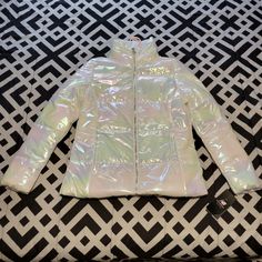 Brand New With Tags! Water & Wind Resistant. Very Cool Iridescent Puffer Tech Jacket By New Balance Size Medium Send Offers, I'd Rather Someone Enjoy This Now During Winter Season. White Reflective Winter Outerwear, Winter White Outerwear With Reflective Details, Fitted Iridescent Outerwear For Winter, Iridescent Fitted Long Sleeve Outerwear, Fitted Iridescent Outerwear For Fall, Casual Iridescent Long Sleeve Outerwear, Quilted Long Jacket, Grey Puffer Jacket, Tech Jacket