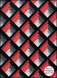 a red and black tie with white squares on it