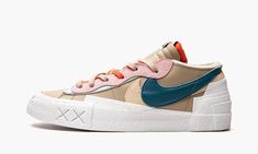 The Kaws x Sacai x Nike Blazer Low “Reed” is one of multiple colorways of the vintage basketball shoe designed by the trio of the legendary graffiti artist, the high fashion brand, and Nike. The “Reed” version of the classic Blazer Low was released in December 2021 and was the fourth colorway released of the design by Kaws, Sacai, and Nike of the shoe that year. Features include a tan leather base with a tan suede Swoosh layered underneath a dark green leather Swoosh on the sides. A light blue l High Fashion Branding, Nike Blazer Low, Vintage Basketball, Blazer Low, Nike Brand, Stadium Goods, Classic Blazer, Graffiti Artist, Nike Blazer