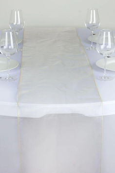 The Champagne Sheer Organza Table Runner is not only visually stunning but also crafted with durability in mind. This table runner is designed to endure the demands of any event, from weddings and banquets to more casual gatherings. Made from high-quality organza fabric, it resists tearing and fraying, thanks to its meticulously serged edges. Organza Table Runner, Runner For Table, Pc Design, Party Catering, Wedding Table Settings, Reception Table, Wedding Catering