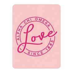 a pink coaster with the words love in it