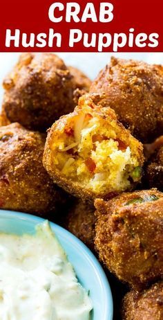 crab hush puppies on a plate with ranch dip