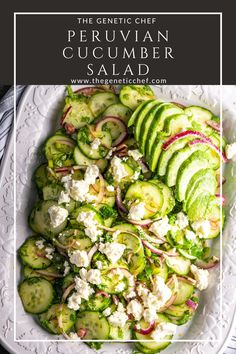 a white plate topped with cucumber salad