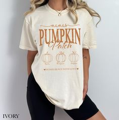 Custom Mama's Pumpkin Patch Comfort Colors Shirt ✨ With Cute Vintage Vibe SIZING & MATERIALS: Printed on Unisex Comfort Colors c1717 garment-dyed t-shirt for a relaxed fit; the fabric brings extra coziness to your wardrobe while the relaxed fit makes it an excellent daily choice.  .: 100% ring-spun cotton .: Medium fabric (6.1 oz/yd² (206.8 g/m *Sizing up 1-2 sizes gives an oversized look* Please compare measurements against our size chart for your perfect fit. Styling ideas - roll up the sleeves, tie a side knot, front tuck, or just wear it as is.  DESIGN/PRINTING: We use DTG (Direct To Garment) Printing which ensures the highest quality of details, color, and durability. *Keep in mind, each shirt is made to order so production and shipping times may vary* Feel free to reach out to us wit Pumpkin Patch Shirt Ideas, Names Cute, Patches Shirt, Autumn Halloween, Comfort Colors Shirt, Vintage Vibe, Styling Ideas, Halloween Season, Fall Shirts