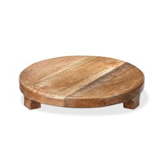 a wooden table with two legs and a small round plate on the top that is made out of wood