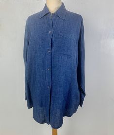 "This is a marvelous Emanuel Ungaro Liberte 100% Linen tunic shirt. Crisp fabric  with collar, front button closure, chest pocket and long cuff sleeves. Beautiful indigo blue color will match all of your wardrobe. Longer length makes this top perfect for jeans, leggings, shorts or skirts. Could be a light jacket over a dress, too. Size small/medium Bust: 46\" Waist: 46\" Hips: 46\" Length: 31.5\" Shoulder to shoulder back: Sleeves: 23\" Excellent like new condition. No issues arrives ready togiv Linen Tunic Shirt, Be A Light, Leggings Shorts, Emanuel Ungaro, Loose Shirt, Linen Tunic, Jeans Leggings, Loose Shirts, Tunic Shirt