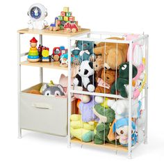 a white shelf filled with stuffed animals and toys