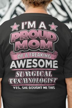 the back of a woman's shirt that says i'm a proud mom