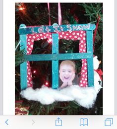 an ornament hanging from a christmas tree that says let's it snow