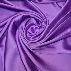 a close up view of a purple fabric