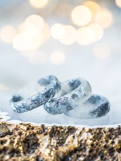 A beautiful pearled white faceted resin ring with silver flakes inside. This resin ring is perfect for stacking! It's faceted all the way around and it is so comfortable to wear. All my resin rings are handmade with self-made molds. they are also hand-sanded and polished, to be smooth and comfortable to wear. Given the nature of the resin, my rings may contain tiny bubbles and imperfections, but I always try to make them as perfect as possible. The listing is for ONE stacking ring with metal fla White Sterling Silver Iced Jewelry, Iced White Sterling Silver Jewelry, White Embellished Jewelry For Anniversary, White Iced Jewelry For Anniversary, White Hypoallergenic Resin Jewelry, Hypoallergenic White Resin Jewelry, Handmade Minimalist White Crystal Ring, Minimalist Silver Resin Jewelry, White Round Resin Jewelry