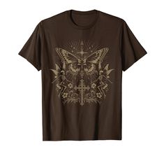 a brown t - shirt with a butterfly on it's chest and an ornate design